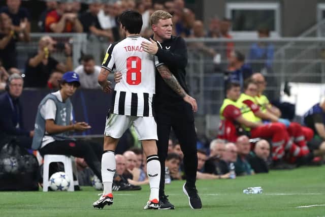 Sandro Tonali of Newcastle United embraces his coach Eddie Howe being substituted during the UEFA Champions League match between AC Mila and Newcastle United FC at Stadio Giuseppe Meazza on September 19, 2023 in Milan, Italy. (Photo by Marco Luzzani/Getty Images)