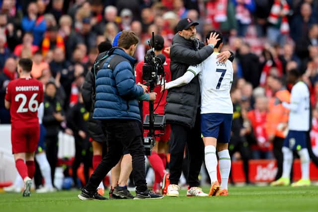 Liverpool managerJurgen Klopp and Tottenham captain Son Heung-min embrace after a Premier League clash at Anfield last season - the two clubs will face off again on Saturday afternoon.