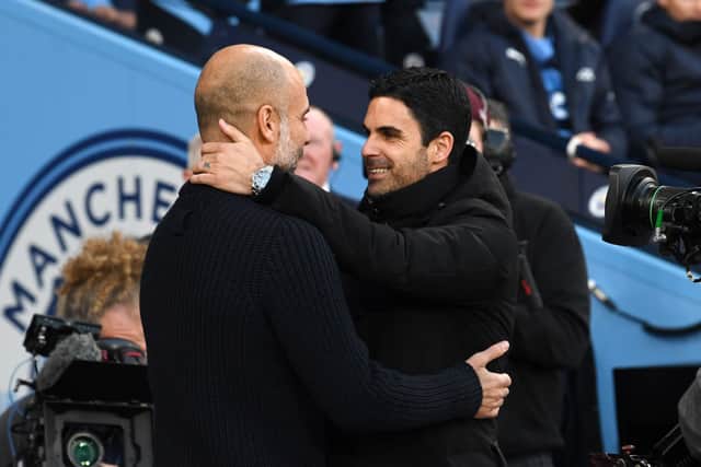 Arsenal manager Mikel Arteta and Man City boss Pep Guardiola. The Gunners are being linked with a potential swoop for City midfielder Kalvin Phillips.