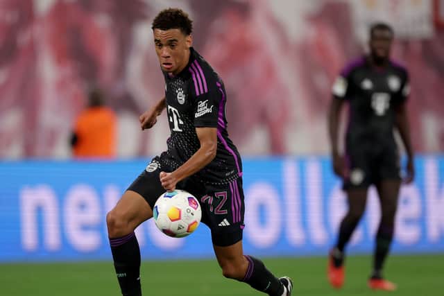 Jamal Musiala runs with the ball during the match against RB Leipzig.