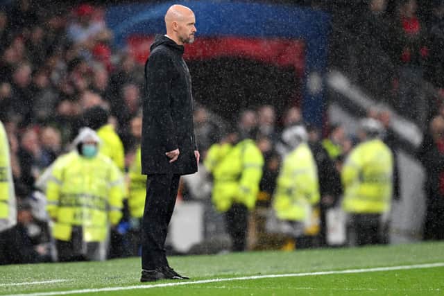 Erik ten Hag cuts a dejected figure in the Old Trafford rain after United’s sixth defeat of the season.