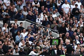 Referee Simon Hooper watches a VAR during the English Premier League football match between Tottenham Hotspur and Liverpool. A notable error during that match has led to plenty of controversy in recent days, with the PGMOL releasing its audio of the incident on Tuesday.