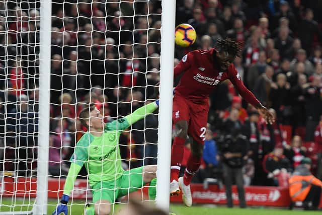 Divock Origi scores a late, late winner while a helpless and hapless Jordan Pickford looks on.
