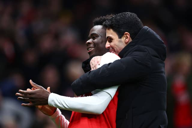 Arsenal manager Mikel Arteta and winger Bukayo Saka. The attacker is a doubt for Saturday’s Premier League clash between the Gunners and London rivals Chelsea