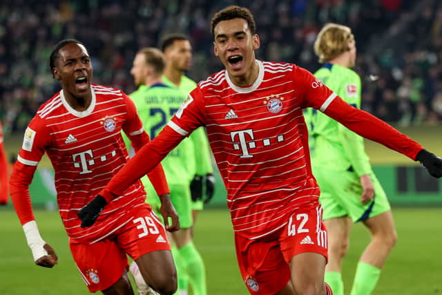 Jamal Musiala celebrates a goal against VfL Wolfsburg - one of 16 he scored last season.