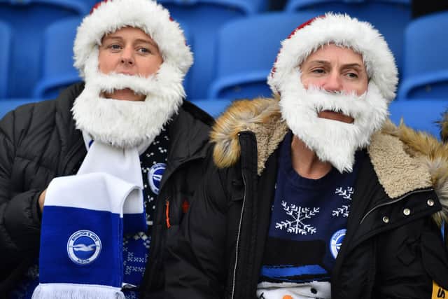 Brighton fans get into the Christmas spirit - but getting to games can be a huge headache.
