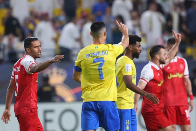Cristiano Ronaldo breaks character to appeal against a penalty he won while playing for Al-Nassr.