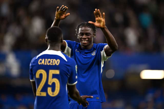 Moises Caicedo and Lesley Ugochukwu of Chelsea celebrate following their sides victory after the Carabao Cup Third Round match between Chelsea and Brighton & Hove Albion