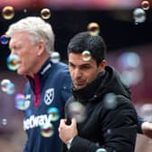 Arsenal manager Mikel Arteta and West Ham boss David Moyes. The Hammers have been linked with a move for Gunners striker Eddie Nketiah, as detailed in today's Premier League transfer rumour round-up.