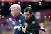 Arsenal manager Mikel Arteta and West Ham boss David Moyes. The Hammers have been linked with a move for Gunners striker Eddie Nketiah, as detailed in today's Premier League transfer rumour round-up.