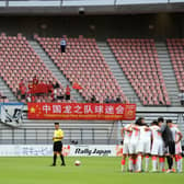 The Hong Kong national football team prepare for a match against China. The two sides met on New Year's Day, with Hong Kong recording a victory over their neighbours for the first time in 29 years. 