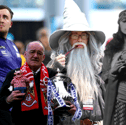 A composite image of Luke Littler, Jim Bowen, Gandalf the Grey, and a fortune teller.