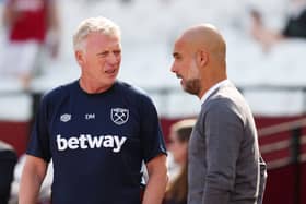 West Ham manager David Moyes and Manchester City boss Pep Guardiola. Kalvin Phillips is currently on loan from the champions with the Hammers, but could he be involved in a swap deal between the two club this summer?