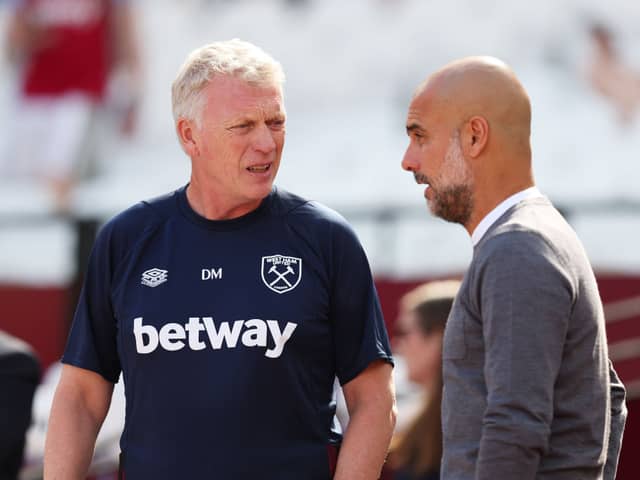 West Ham manager David Moyes and Manchester City boss Pep Guardiola. Kalvin Phillips is currently on loan from the champions with the Hammers, but could he be involved in a swap deal between the two club this summer?