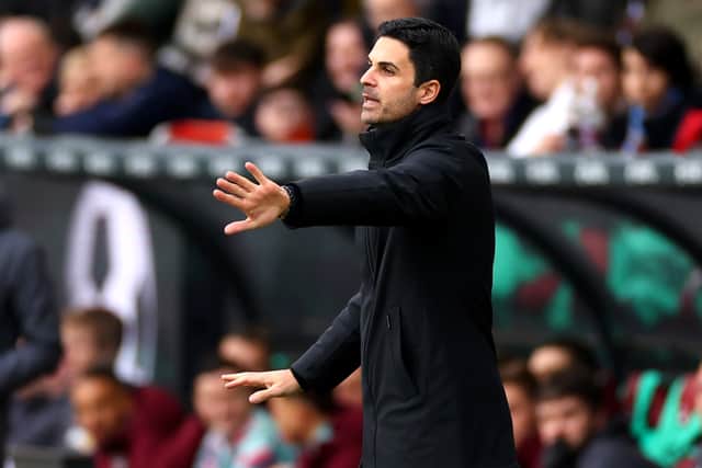 Does Mikel Arteta really set his team up in a 4-3-3, or is that an old-fashioned way to describe it?