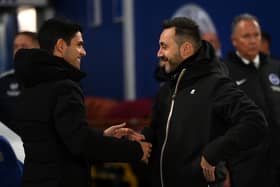 Arsenal manager Mikel Arteta and Brighton manager Roberto de Zerbi. The Gunners are reportedly interested in Albion striker Evan Ferguson. 