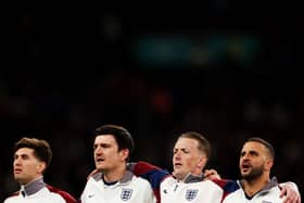 England players John Stones, Harry Maguire, Jordan Pickford, and Kyle Walker