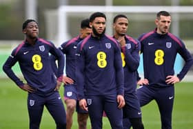 England players Kobbie Mainoo, Joe Gomez, Ezri Konsa, and Lewis Dunk.