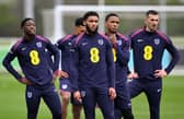 England players Kobbie Mainoo, Joe Gomez, Ezri Konsa, and Lewis Dunk.