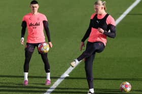 Man City players Erling Haaland and Phil Foden.