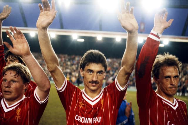 Sammy Lee, Ian Rush and Phil Neal celebrate their league title at Anfield back in 1984.