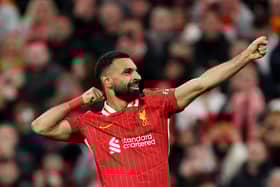 Mohamed Salah of Liverpool celebrates scoring his team's second goal during the UEFA Champions League 2024/25 League Phase MD2 match between Liverpool FC and Bologna FC 1909 at Anfield on October 02, 2024 in Liverpool, England. (Photo by Carl Recine/Getty Images)