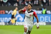 Omar Marmoush celebrates his 1-1 during the German first division Bundesliga football match between Eintracht Frankfurt and FC Bayern Munich. (Photo by DANIEL ROLAND/AFP via Getty Images)