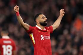 Mohamed Salah of Liverpool celebrates scoring his team's second goal during the Premier League match between Liverpool FC and Brighton & Hove Albion FC at Anfield on November 02, 2024 in Liverpool, England. (Photo by Jan Kruger/Getty Images)