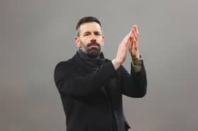  Ruud van Nistelrooy, Manager of Leicester City, shows appreciation to the fans following a loss in the Premier League match between Liverpool FC and Leicester City FC at Anfield on December 26, 2024 in Liverpool, England. (Photo by Jan Kruger/Getty Images)