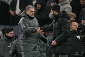 Tottenham Hotspur manager Ange Postecoglou with Manchester United boss Ruben Amorim