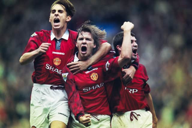 Gary Neville, David Beckham and Roy Keane celebrate a 1997 win over West Ham in the last kit to sport patterned sleeves.