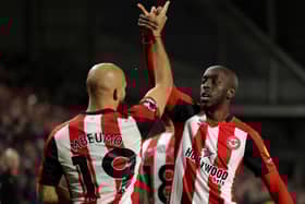 Yoane Wissa of Brentford (r) celebrates scoring his team's first goal with Bryan Mbeumo during the Premier League match between Brentford FC and Everton FC at Brentford Community Stadium on February 26, 2025 in Brentford, England. (Photo by Richard Heathcote/Getty Images)