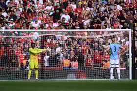Andre Onana of Manchester United faces Manchester City's Erling Haaland during the 2024 Community Shield penalty shootout | Getty