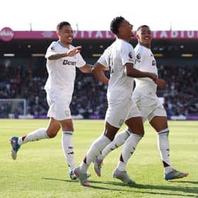 Morgan Rogers celebrates with Ollie Watkins and Jacob Ramsey | Getty Images
