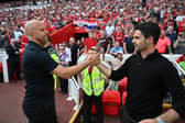 A moment of respect between Arne Slot and Mikel Arteta before the Premier League match between Liverpool and Arsenal | Getty Images