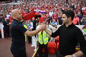 A moment of respect between Arne Slot and Mikel Arteta before the Premier League match between Liverpool and Arsenal | Getty Images