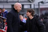 Arne Slot, Manager of Liverpool, interacts with Thomas Frank, Manager of Brentford, prior to the Premier League match between Brentford FC and Liverpool FC at Gtech Community Stadium on January 18, 2025 in Brentford, England. (Photo by Ryan Pierse/Getty Images)