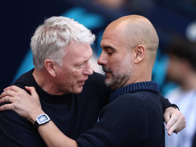 David Moyes and Pep Guardiola embrace before their sides clash in the Premier League | Getty Images
