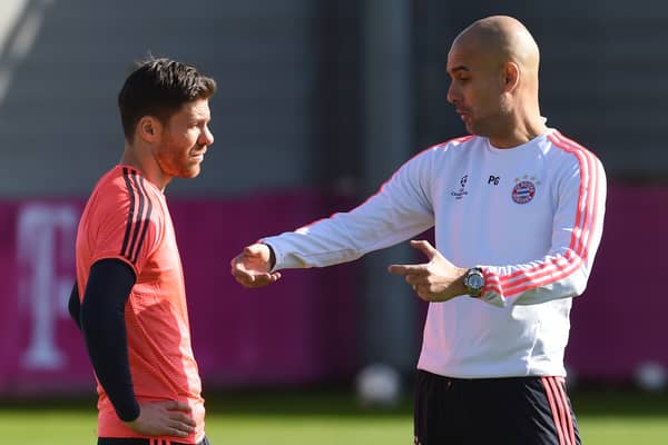 Xabi Alonso and Pep Guardiola in a Bayern Munich traning session in 2016 | Getty Images