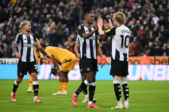 Anthony Gordon and Alexander Isak celebrate scoring for Newcastle against Wolves in the Premier League | Getty Images
