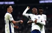 Aston Villa's Morgan Rogers celebrates with Crystal Palace duo Eberechi Eze and Marc Guehi for England | Getty Images
