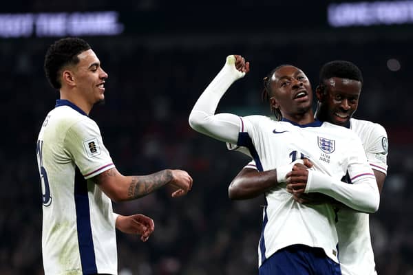 Aston Villa's Morgan Rogers celebrates with Crystal Palace duo Eberechi Eze and Marc Guehi for England | Getty Images