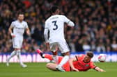 Evan Ferguson challenges Leeds' Junior Firpo, the pair could be Premier League teammates next season | Getty Images