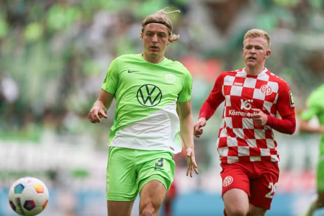 Sebastiaan Bornouw (left) in action for Wolfsburg