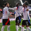 Malick Fofana celebrates with his Lyon teammates against Rangers in the Europa League | PAUL ELLIS/AFP via Getty Images