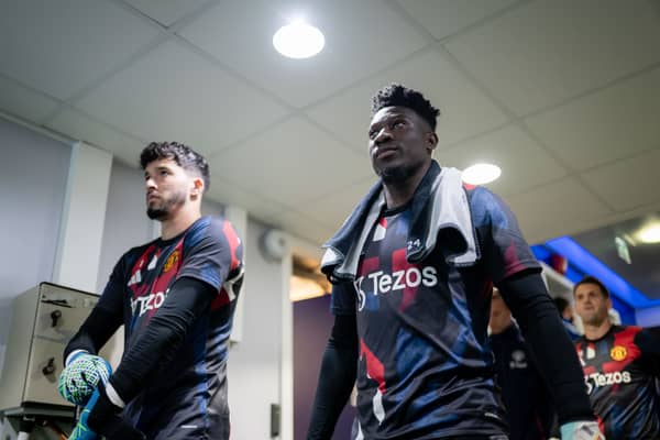 Altay Bayindir and Andre Onana prepare to warm up for Manchester United's Premier League clash with Chelsea | Ash Donelon/Manchester United via Getty Images
