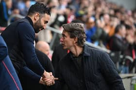 Ruben Amorim and Thomas Frank shake hands ahead of a Premier League clash in the 2024/25 season.
