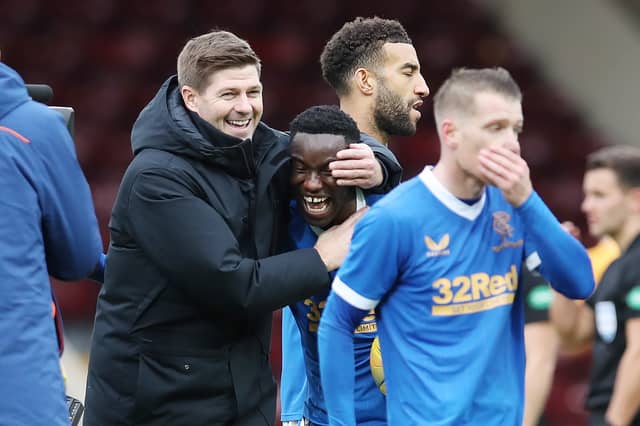 Steven Gerrard celebrates with his Rangers players | Ian MacNicol/Getty Images