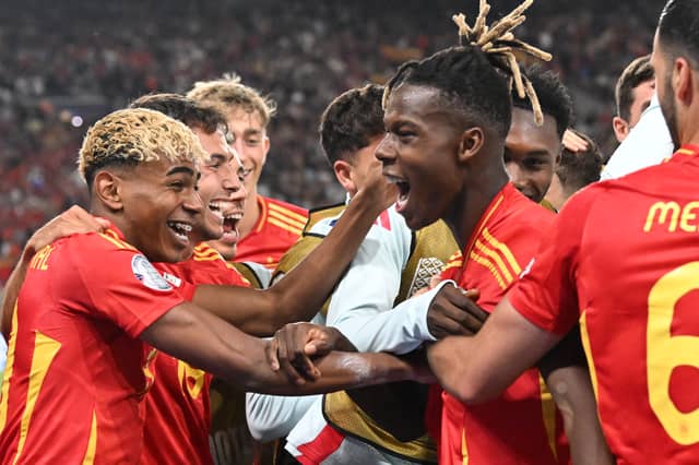 Athletic Club's Nico Williams celebrates with his Spain teammates including Lamine Yamal after scoring against Germany in the UEFA Nations League | Photo by THOMAS KIENZLE/AFP via Getty Images