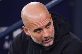 Pep Guardiola looks on as Manchester City take on Bournemouth in the Premier League | Carl Recine/Getty Images